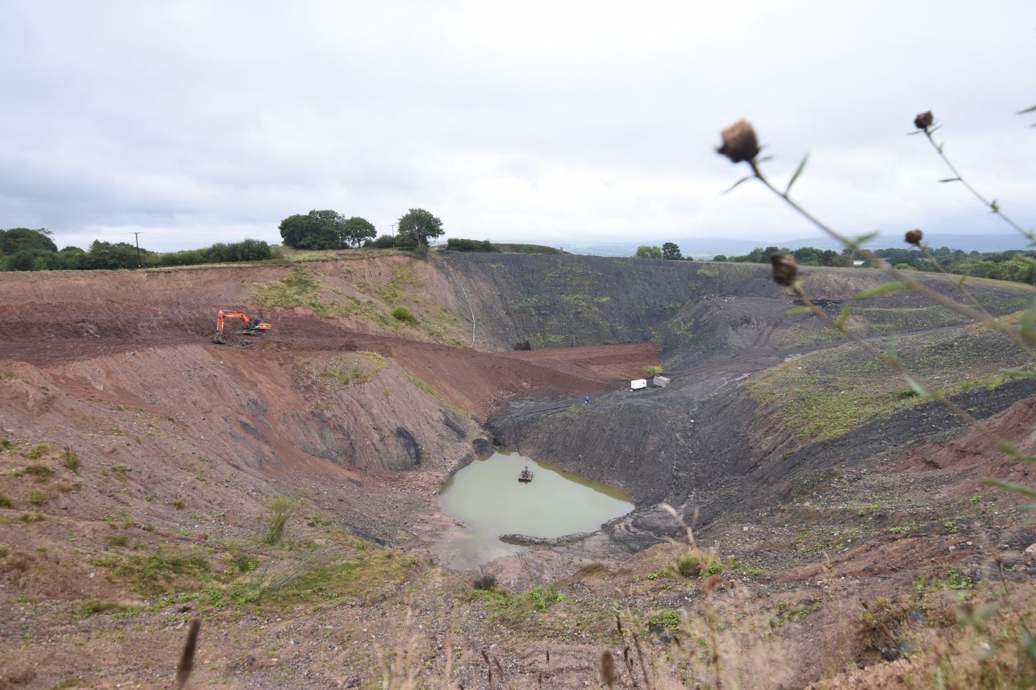 Glan Lash coal mine with diggers and coal waste