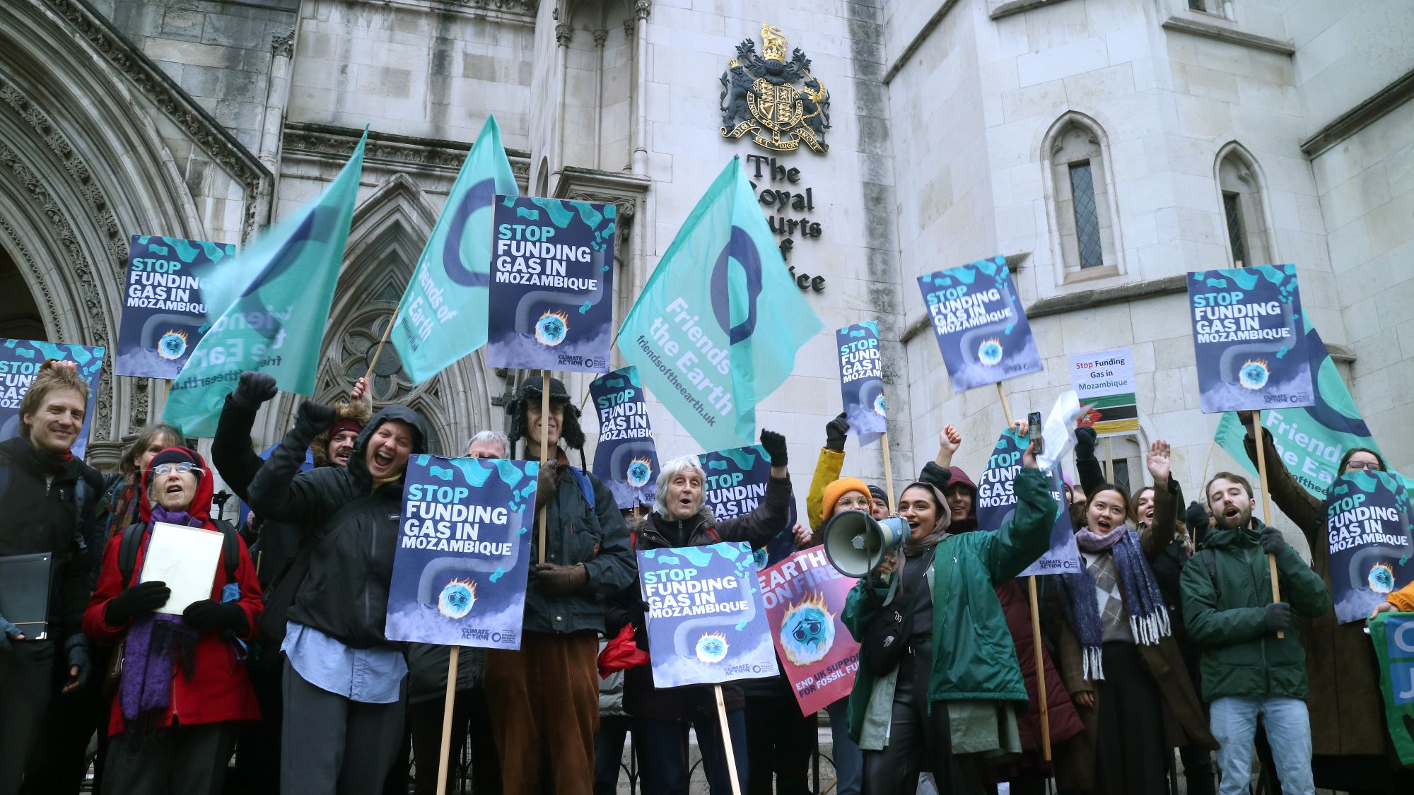 Friends of the Earth outside the Royal Courts of Justice to protest the government's funding of gas projects in Mozambique.